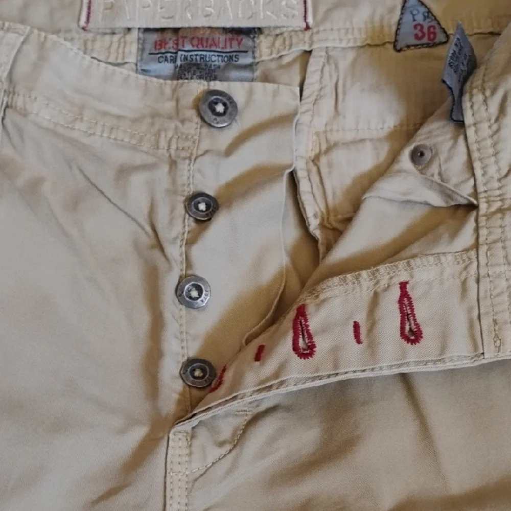 Paperbacks Tan Flat Front Shorts